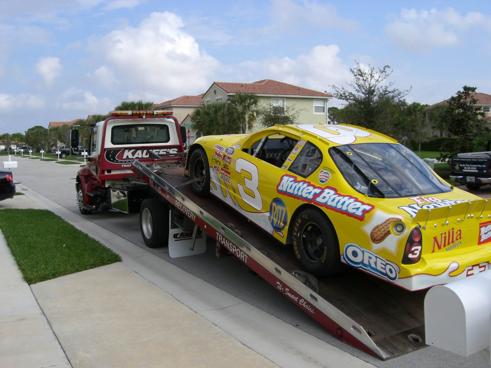 Kauff's truck transporting race car