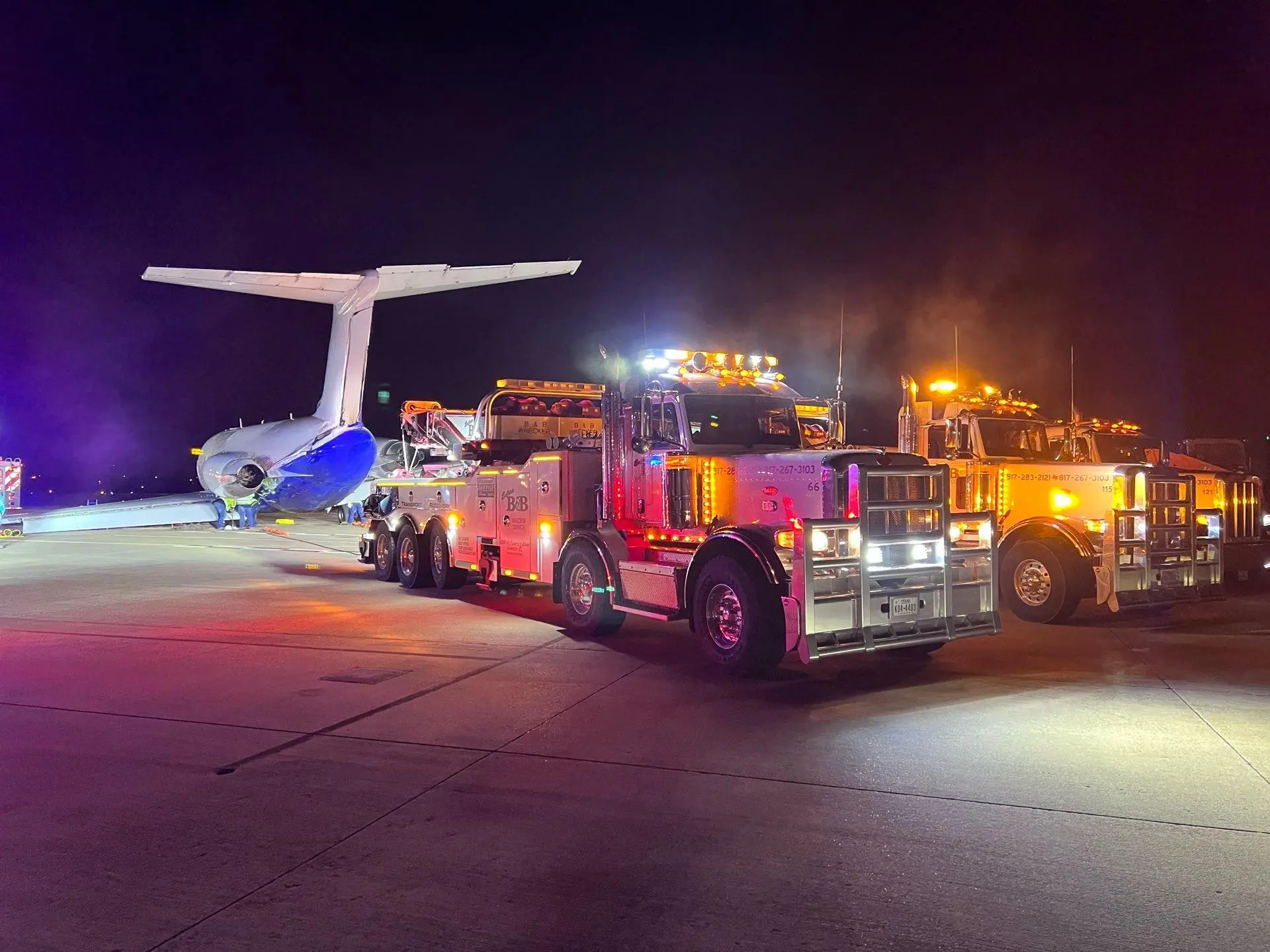 Euless B&B Truck hauling airplane
