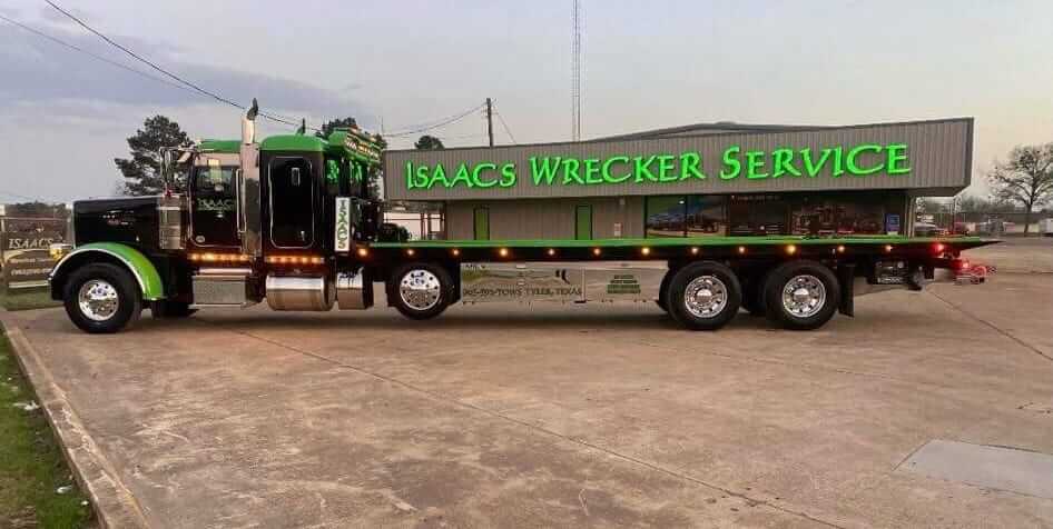 Isaacs Wrecker Service Industrial roll back used for specialized transportation services in Texas